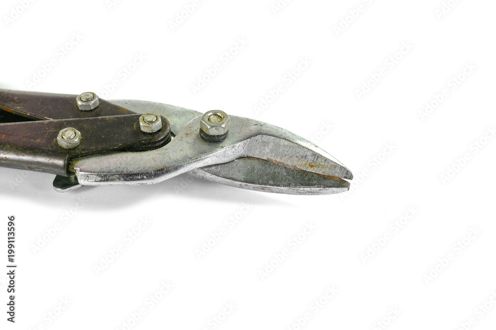 Used tin snips isolated on a white background. Used tin snips isolated on a white background.