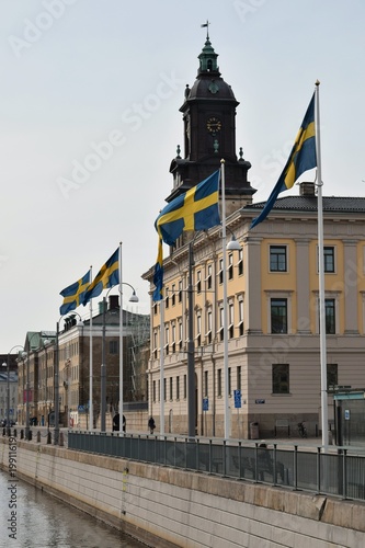 Gothenburg City Hall with row of Swedish flags photo