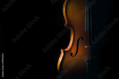 Violin on a black background with spot light