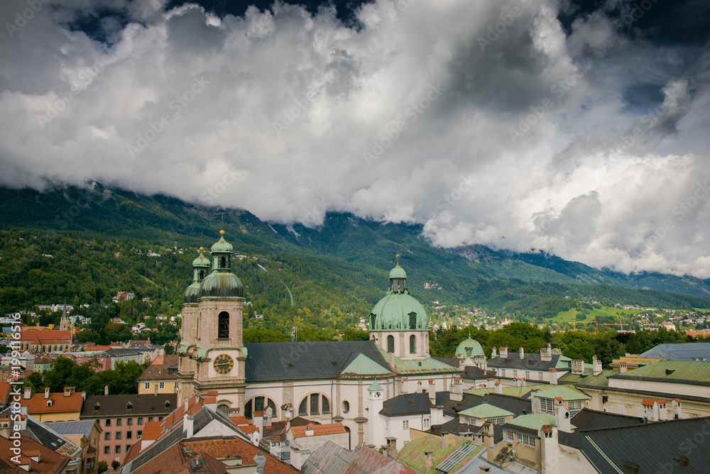 Innsbruck, Austria.  View from the tower. Top view of the city. Sky with clouds above the beautiful city. 
