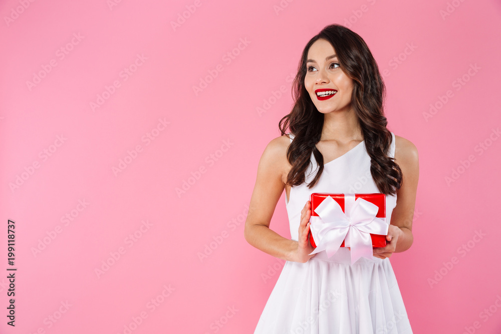 Cute pretty young asian woman holding gift box. Cute pretty young asian woman holding gift box.