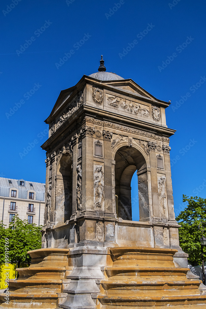 Obraz premium Fountain of the Innocents (Fontaine des Innocents, 1547 - 1550) at place Joachim-du-Bellay. Paris. Fountain of the Innocents is oldest monumental fountain in Paris, France.