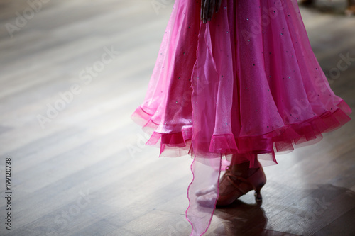 Closeup of dancer's legs as they do the ballroom dance