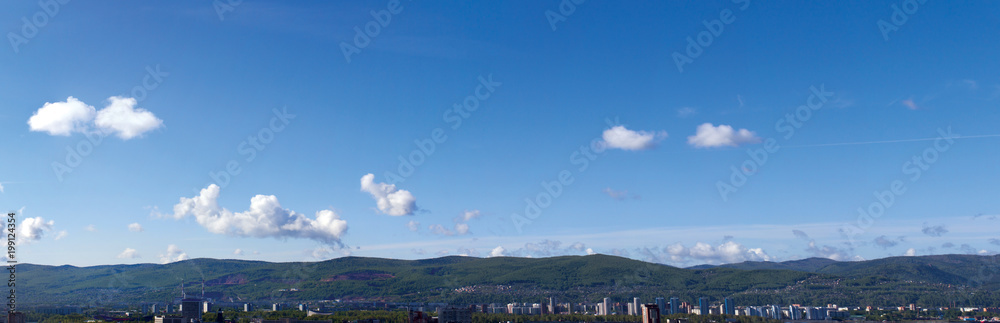 Panorama city Krasnoyarsk Siberia sky. A wide view of the sky. Summer. Day