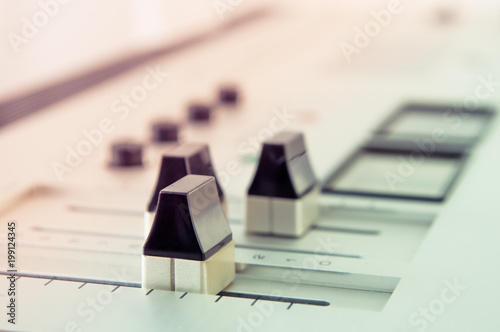 Sound mixing console detail, close up photo