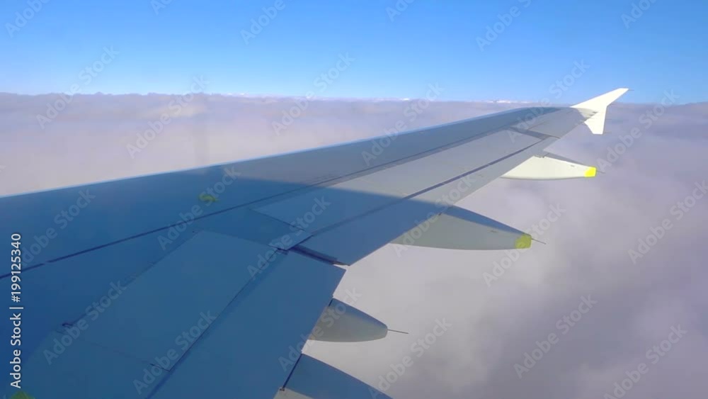 Traveling by air. View through an airplane window Traveling by air. View through an airplane window