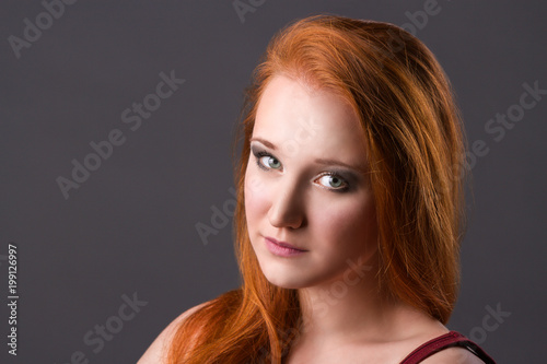 young attractive red hair woman