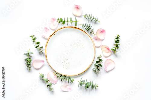 light breakfast with spring pattern on white background top view