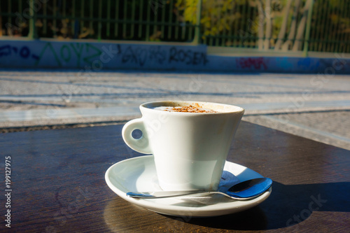 Coffee cup on outdoor table
