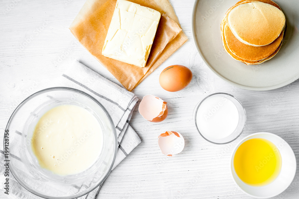 cooking pancake on white background top view ingredients for mak cooking pancake on white background top view ingredients for mak