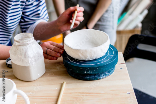 workshop production of ceramic tableware product painting