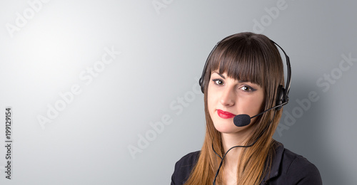 Young female telemarketer on a white background