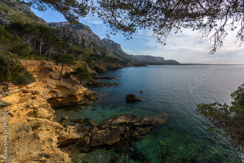 Exotic seascape with crystal clear waters, beautiful mountains and blue sky. Es Caló, Mallorca. Mediterranean island © Roberto