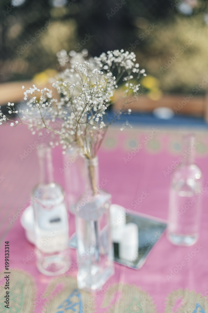 Small flowers in the bottles Small flowers in the bottles