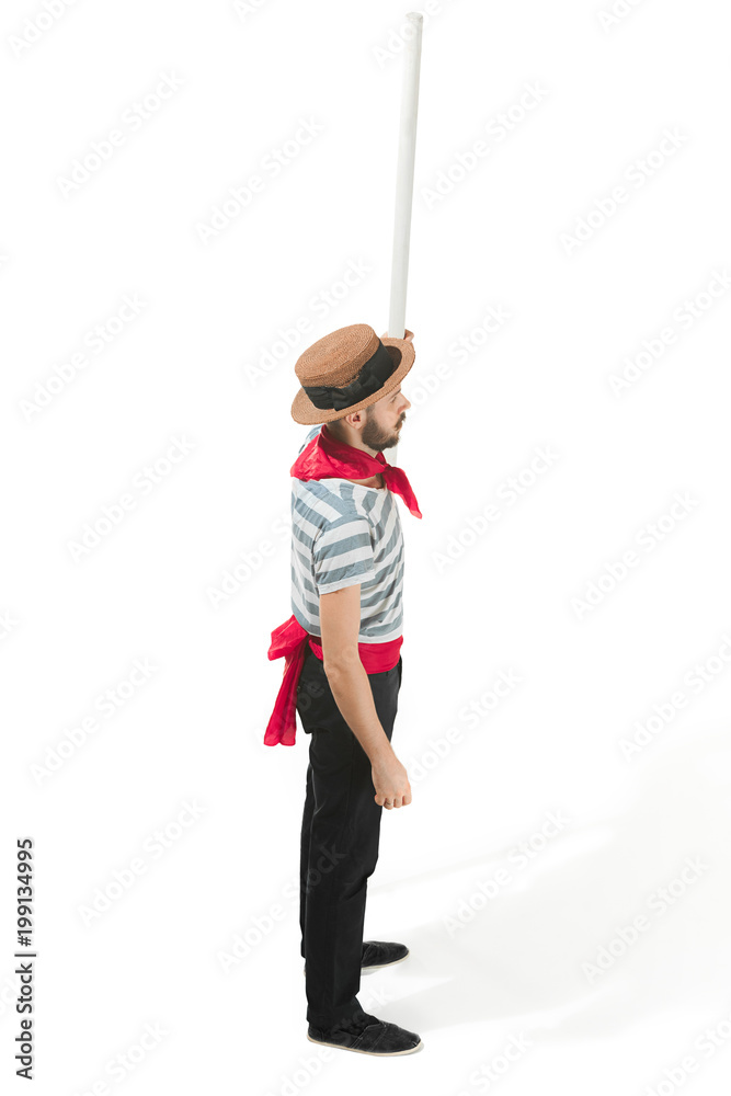 Caucasian man in traditional gondolier costume and hat Caucasian man in traditional gondolier costume and hat