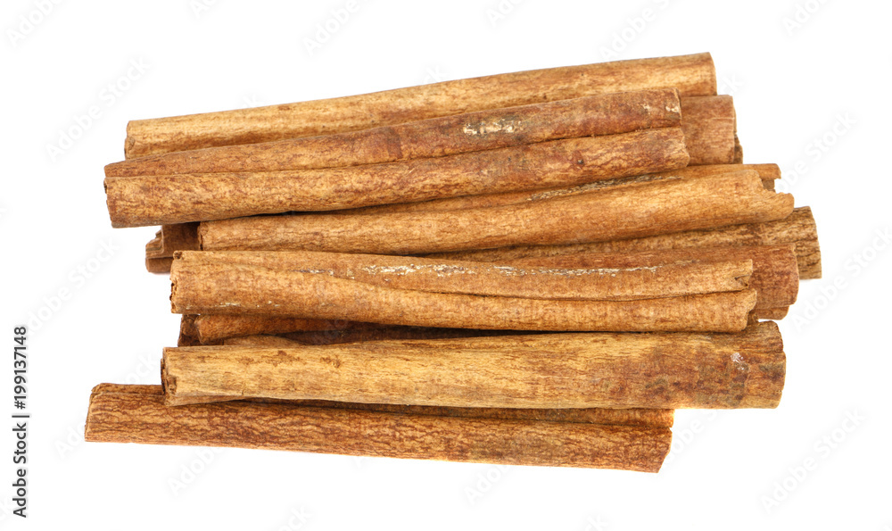 Cinnamon stick isolated on white background. Close-up. Cinnamon stick isolated on white background. Close-up.