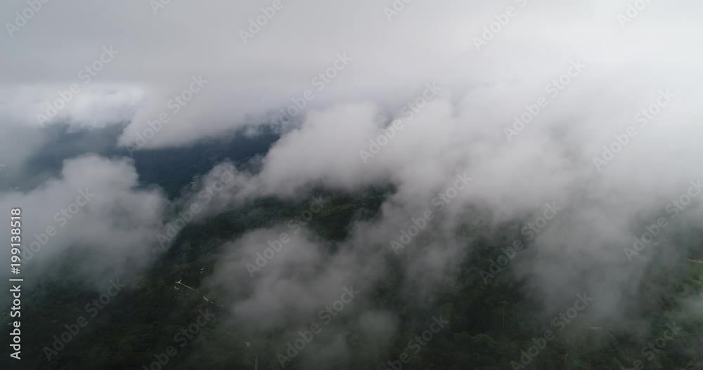 AERIAL. Flight trough clouds over the earth from an airplane AERIAL. Flight trough clouds over the earth from an airplane