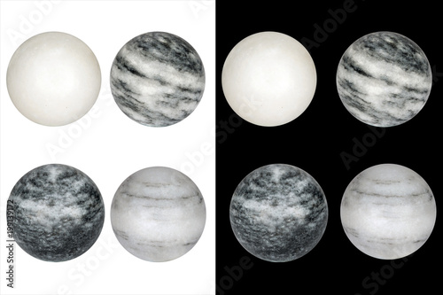 stone balls with black and white streaks
