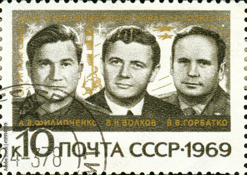 Ukraine - circa 2018: A postage stamp printed in Soviet Union show Soviet cosmonauts A. V. Philipchenko, V. N. Volkov, V. V. Gorbatko. Series: Group Space Flight. Circa 1969. photo