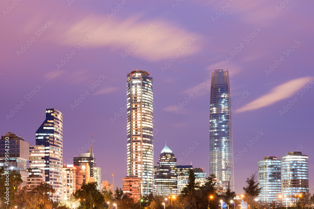 Naklejka premium Skyline of Financial District in Las Condes from Bicentennial park in Vitacura, Santiago de Chile, South America