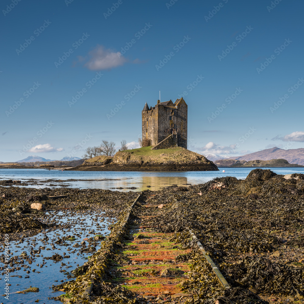 Castle Stalker is a medieval tower house standing on a small rocky islet in  the mouth