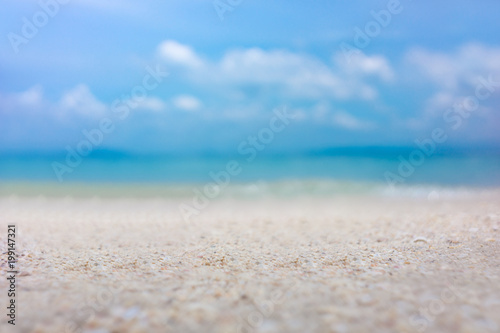 The blur cool sea background ,Abstract summer background Blur summer white sand beach with sparkling sea water.