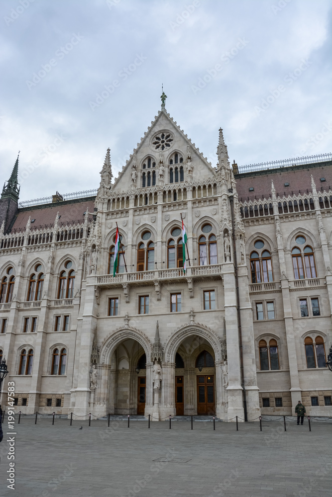 The Budapest parliament and a statue from the side
