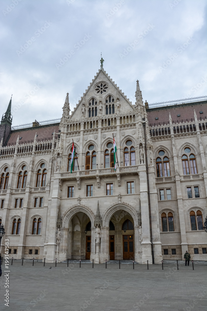 The Budapest parliament and a statue from the side The Budapest parliament and a statue from the side