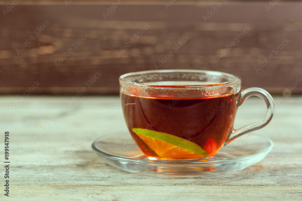 Cup of tea on wooden table Cup of tea on wooden table