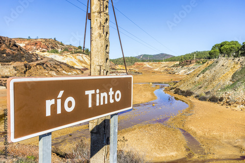 Obraz w ramie Rio Tinto information sign with the river itself, Andalusia, Spain