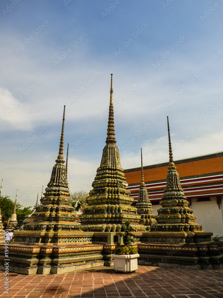 Fototapeta premium Colorful stupas at Wat Pho (Buddhist temple) in Bangkok, Thailand