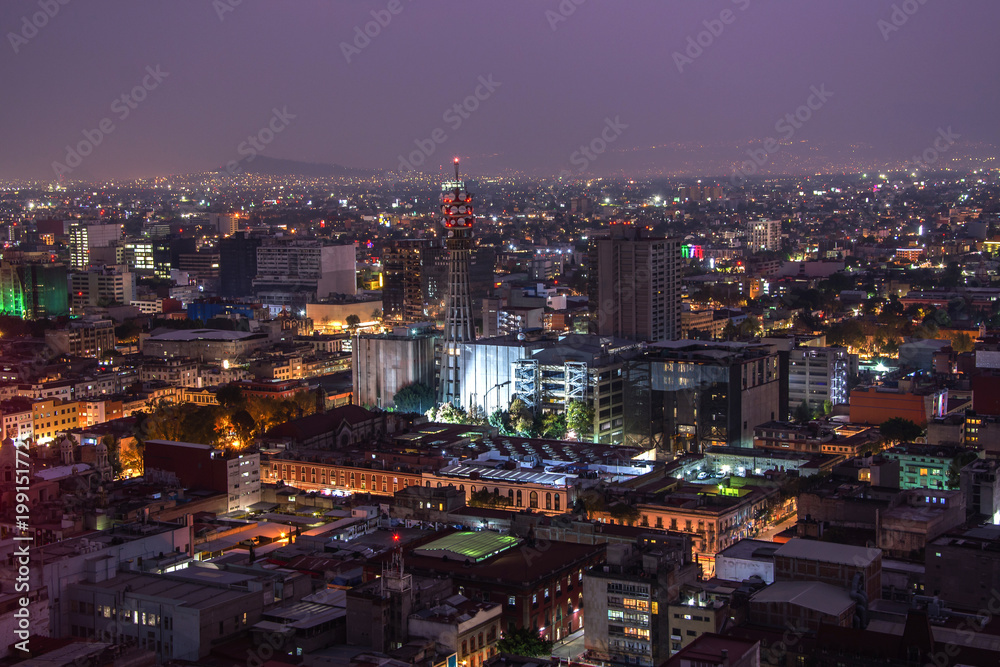 Fototapeta premium Aerial view of mexico city downtown skyscrappers at sunset time before night.