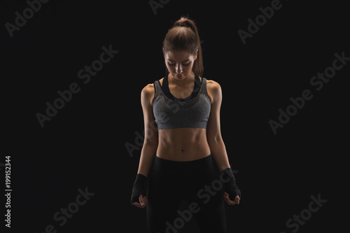 Gorgeous young woman with boxing bandage