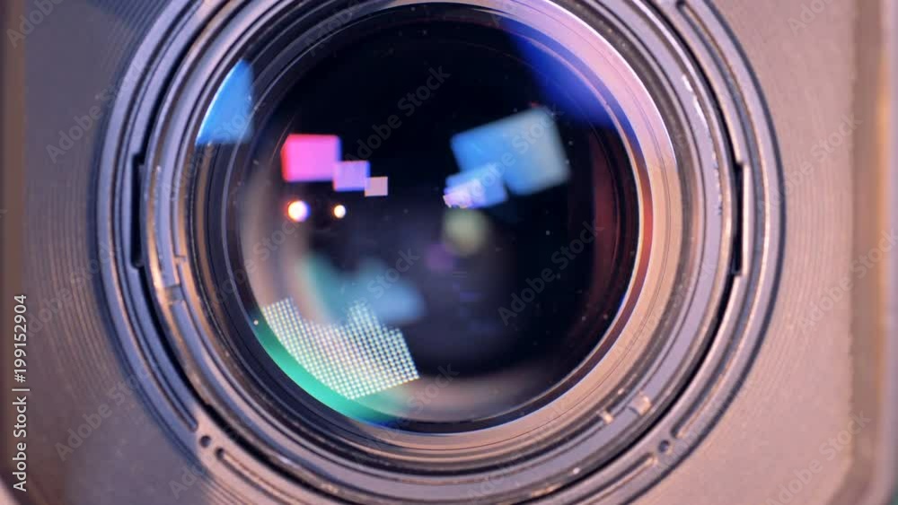 Internal objective lens of a video camera is zooming in