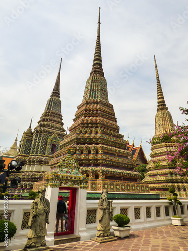 Beautiful stupas in the Phra Maha Chedi Si Ratchakan area of Wat Pho (Buddhist temple) in Bangkok, Thailand