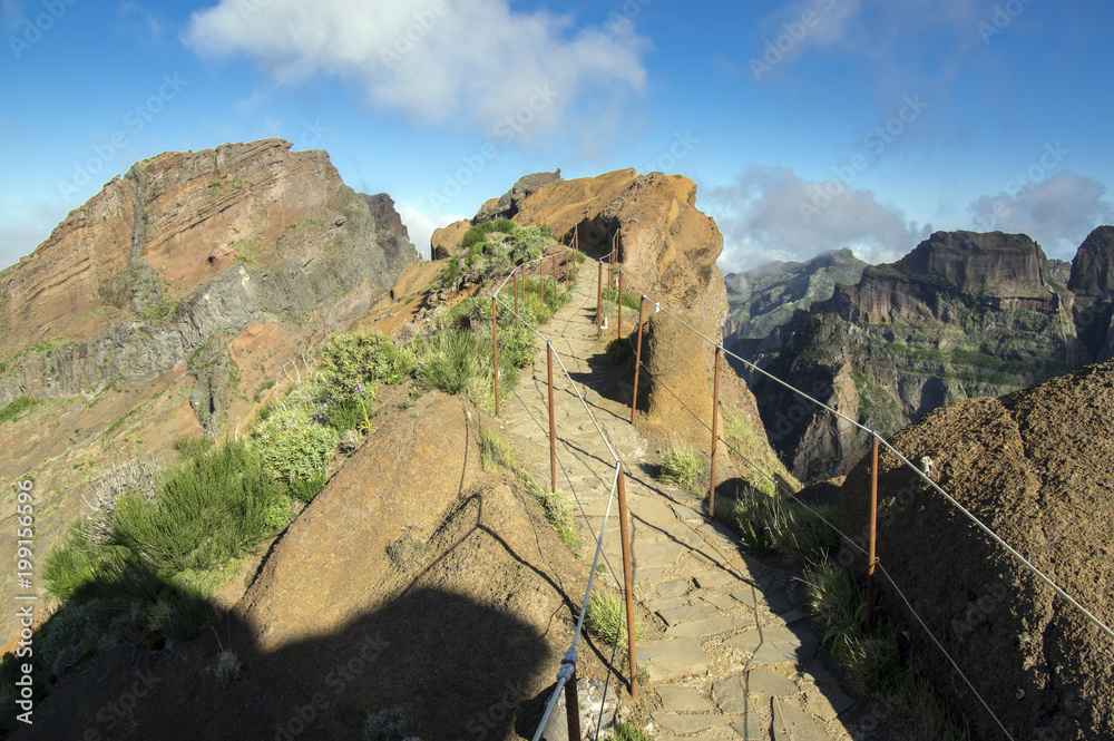 Pico do Arieiro hiking trail, amazing magic landscape with incredible views, rocks and mist