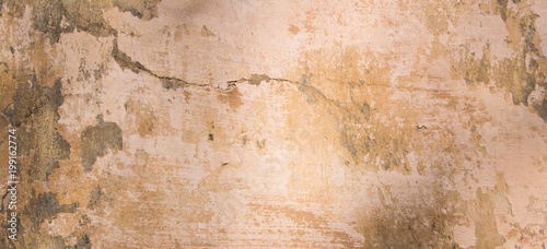 Old vintage grungy plaster painted wall texture background