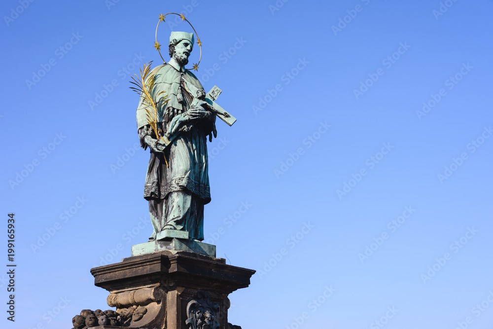 Statue of John of Nepomuk on the Charles bridge in Prague.