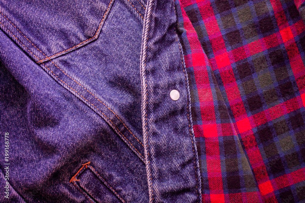 Pattern of checkered Scottish fabric with jeans to create a background Pattern of checkered Scottish fabric with jeans to create a background