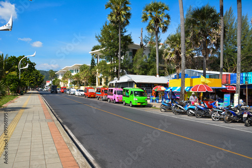Street trading, tuk-tuk and rent scooters on the srteet  in Phuket. Thailand. photo