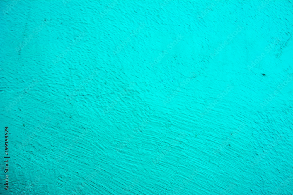 Obraz premium Wall painted in blue texture. Seamless texture of a light pale green concrete wall. Abstract background.