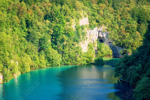 Panoramic view of waterfalls  rocks and lakes from popular tourist viewpoint in Plitvice Lakes National park. Amazing nature summer landscape  famous landmark in Croatia