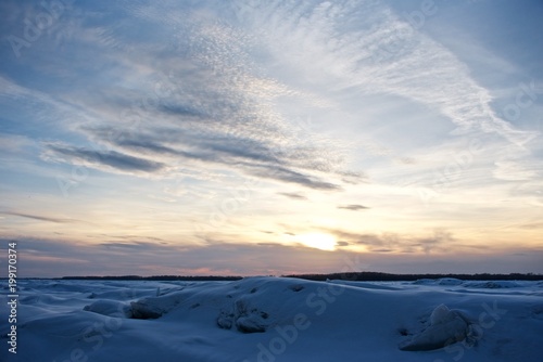 Colored winter landscape. Evening view. Sunset over Volga river. © German