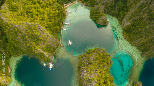 Very beautyful lagoon with boats. Paradise islands in Philippines. Kayangan Lake. Fisheye view.