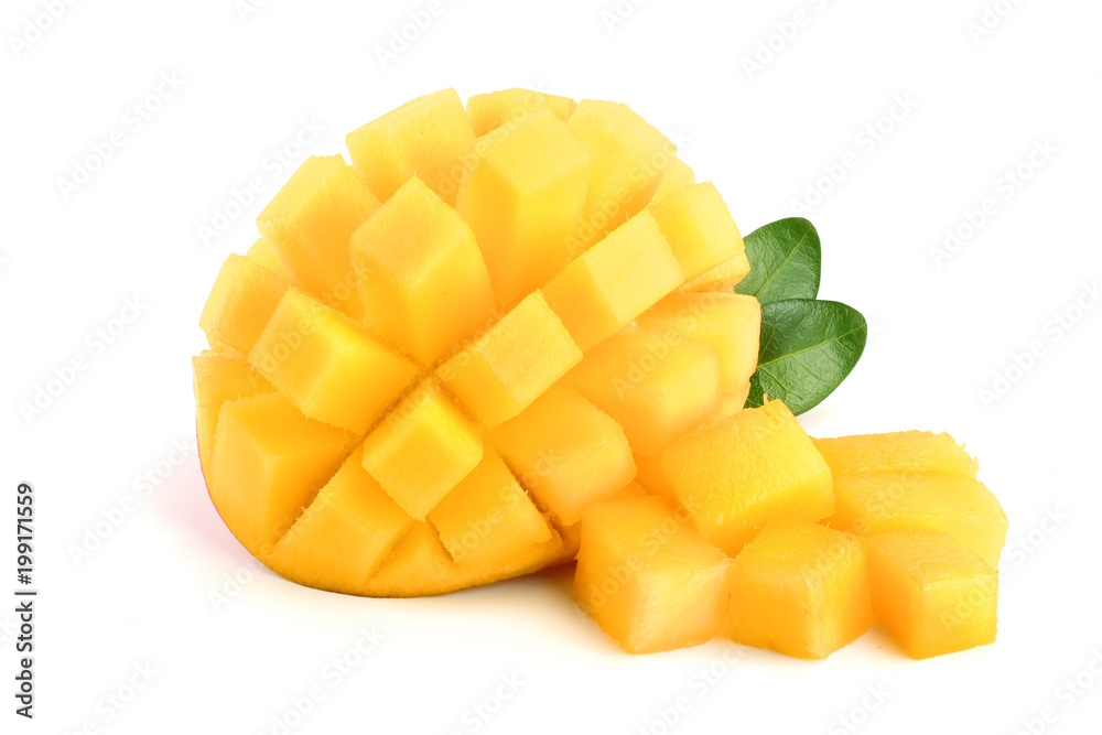Mango fruit half with leaves isolated on white background close-up Mango fruit half with leaves isolated on white background close-up