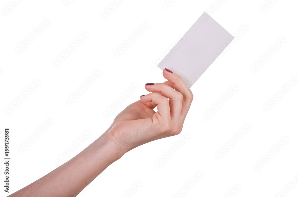Well-groomed female hand with manicure and red lacquer holding an empty white card