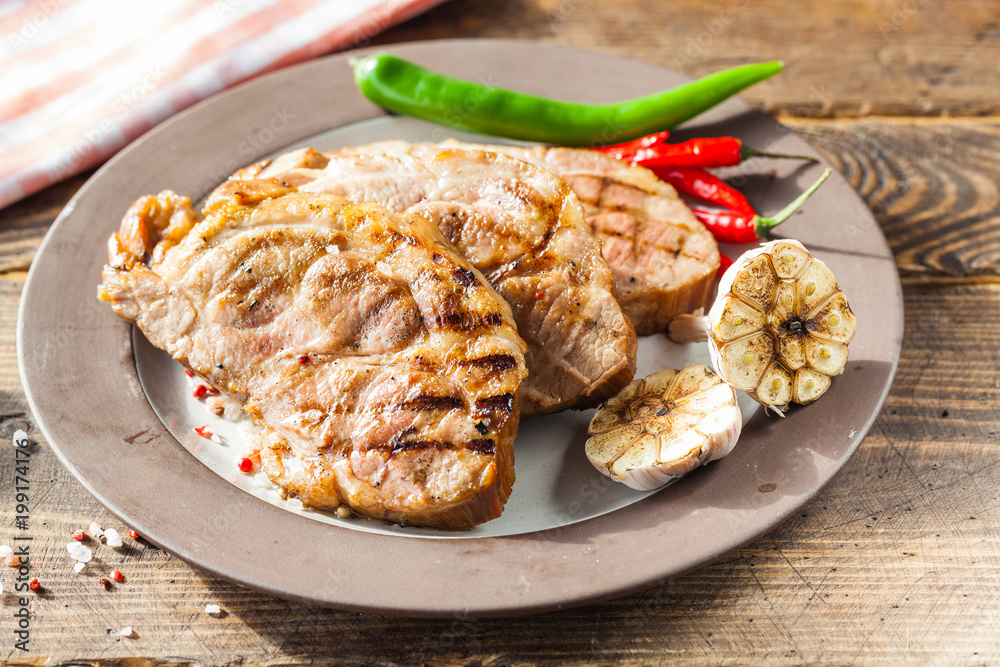 pork steak on the grill
pork steak on the grill