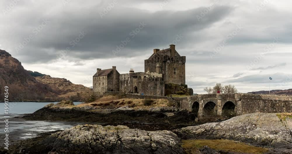 EILEAN DONAN, SCOTLAND MARCH 2018: Time lapse clip of clouds moving past Eilean Donan castle in Scottish highlands in March 2018. EILEAN DONAN, SCOTLAND MARCH 2018: Time lapse clip of clouds moving past Eilean Donan castle in Scottish highlands in March 2018.