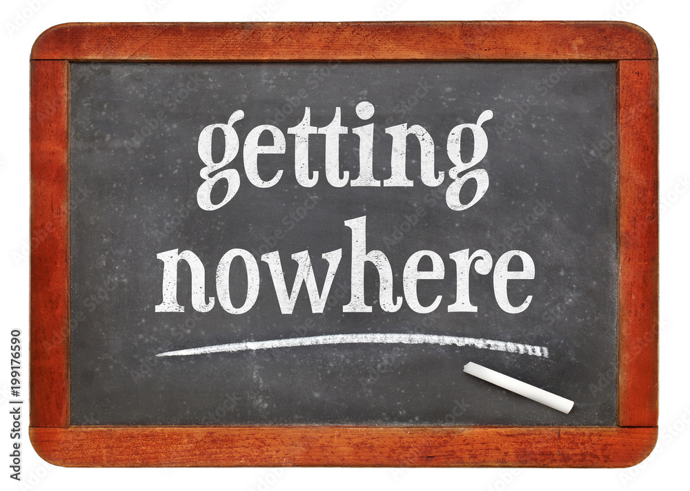 Fototapeta premium getting nowhere text on balckboard