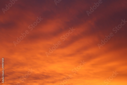 stunning orange clouds at sunset © rick